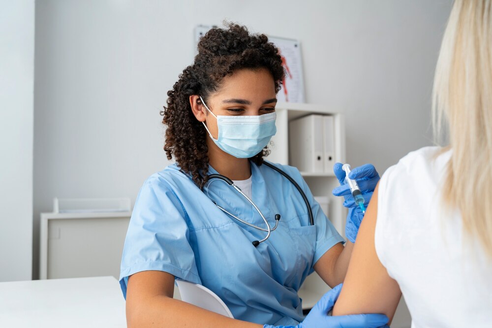 Female nurse at the clinic practicing medicine