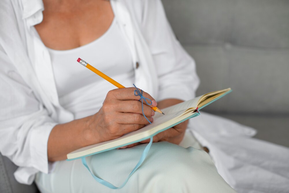 Woman wearing a string on finger for reminder